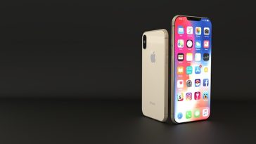 iPhone X doré debout à côté de son reflet vertical sur une surface sombre, intégrant des applications sociales innovantes.